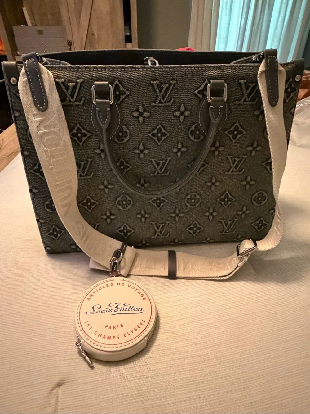 Louis Vuitton Embossed Monogram Tote in Gray with Cream Strap